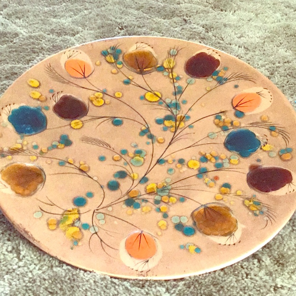 Hand painted on large round copper plate.